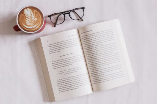 Open Book and Glasses with Coffee